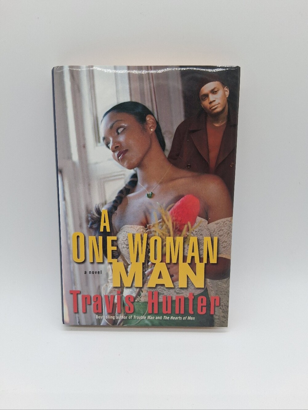 A One Woman Man Novel By Travis Hunter Hardcover Book